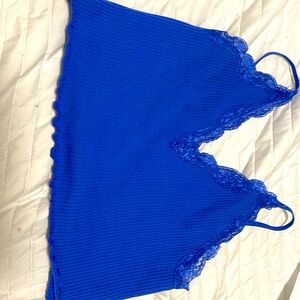 selling a blue crop top